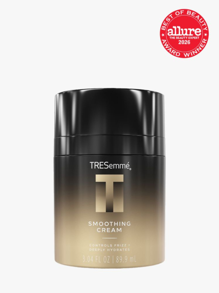 Black and gold container of Tresemmé A-List Smoothing Cream with Allure Best of Beauty stamp in the top right corner on a light gray background
